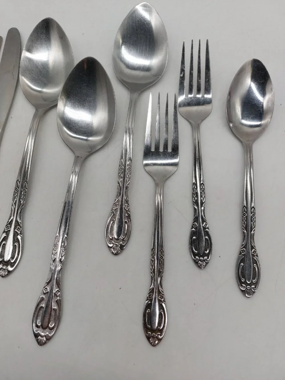 Northland Korea Stainless Flatware w Roses Spoons Knives Forks Lot Of 9